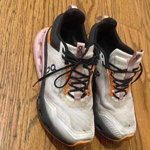 On Running Women's White and Black Sneakers with Pink and Orange Accents